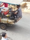 Seller of sugar cane juice in small city