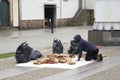 Selling bootleg or African American selling bags in the middle of the street in Porto