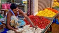 Selling flowers at an Indian market.