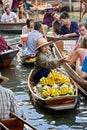 Selling food at the Damnoen Saduak floating market, Bangkok Thailand