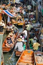 Selling food at the Damnoen Saduak floating market, Bangkok Thailand