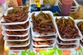 Selling mexican snack Charales, fried little fishes, with sauce hot and lemon Royalty Free Stock Photo