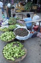 Selling off assorted fruits and vegetables busy market Royalty Free Stock Photo