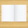 Sells notebook papers on wood table background.