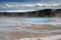 Seltun / Krysuvik KrÃÂ½suvÃÂ­k: Steaming geothermal valley with natural blue pool and snowcapped mountain