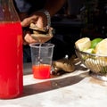 Seltzer Soda Drink in Sicily `Selz` Ã¢â¬â Traditional Italian Kiosk Background with Red Orange Drink and Lemons on Marble