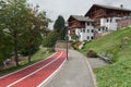 A red city bike fast lane let you move safely all long the town