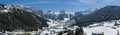Selva Val Gardena during a sunny winter Day surrounded by the Dolomites in South Tyrol Royalty Free Stock Photo