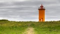 Selvogsviti Lighthouse under stormy clouds Royalty Free Stock Photo