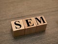 SEM Search engine marketing, text words typography written with wooden letter, life and business motivational inspirational terms Royalty Free Stock Photo