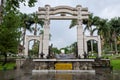 Semarang, Indonesia - December 3, 2017 : Main gate of Vihara Buddhagaya Watugong with a rock shaped like a gong in front of it.