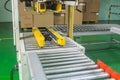 The semi auto taping machine for packing process