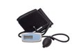 Semi-automatic digital tonometer for measuring blood pressure and pulse rate on a white background Royalty Free Stock Photo