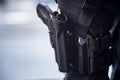 Pistol Holstered on Thigh on Security Personnel