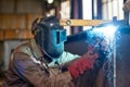 Semi-automatic welding of metal structures in the shop Royalty Free Stock Photo