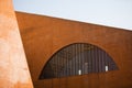 Semi-circular window in brick building