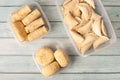 semi-finished products in containers on a blue wooden table. dumplings, pancakes, cutlets Royalty Free Stock Photo