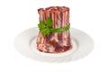 Semi-finished products made of wild boar meat on the plate - ribs, isolated