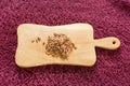 Red rice on a wooden board