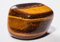 Semi-precious stone - tiger`s eye Royalty Free Stock Photo