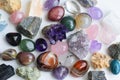 Semi-precious stones of different colors. Amethyst and amethyst druse crystals, rose quartz, agate, apatite, aventurine, olivine,