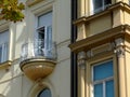 Balcony on classic european residential building. white wrought iron balustrade Royalty Free Stock Photo