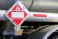 Semi Trailer with a sign to indicate the transport of hazardous flammable liquids on the side of the tank Royalty Free Stock Photo