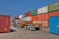 Semi-trailer truck and colorful shipping containers