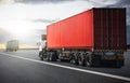Semi Trailer Truck Driving on Highway Road. Shipping Container. Freight Trucks Logistics, Cargo Transport. Royalty Free Stock Photo