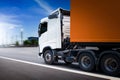 Semi Trailer Truck Driving on The Road with Blue Sky. Shipping Cargo Container, Freight Truck Logistic, Cargo Transport Royalty Free Stock Photo