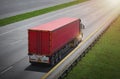 Semi Trailer Truck Driving on the Road. Cargo Shipping Container Trucks. Delivery. Cargo Shipment. Lorry Freight Truck Logistics Royalty Free Stock Photo