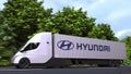 Electric semi-trailer truck with HYUNDAI logo on the side. Editorial 3D rendering