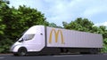 Electric semi-trailer truck with MCDONALD`S logo on the side. Editorial 3D rendering