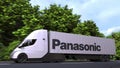 Electric semi-trailer truck with PANASONIC logo on the side. Editorial 3D rendering