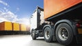 Semi Trailer Truck with Shipping Cargo Container Parking lot at a Blue Sky. Load Trucks Delivery Business . Industry Freight Truck Royalty Free Stock Photo