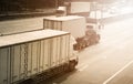 Semi Trailer Trucks Driving on Highway Road with The Sunshine. Truck Transport. Diesel Trucks. Lorry. Freight Truck Logistic. Royalty Free Stock Photo