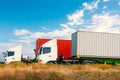 Semi Trailer Trucks Driving on The Road with A Blue Sky. Shipping Cargo Container. Freight Truck Logistic Transport. Royalty Free Stock Photo