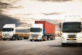 Semi Trailer Trucks Driving on The Road with The Sunset. Shipping Cargo Container. Freight Truck Logistic. Cargo Transport Royalty Free Stock Photo