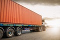 Semi Trailer Trucks Driving on The Road with The Sunset Sky. Shipping Cargo Container, Freight Truck Logistic. Royalty Free Stock Photo