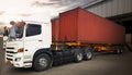 Semi Trailer Trucks Parked Loading at Dock Warehouse. Delivery Trucks Shipping Containers. Distribution Warehouse. Freight Truck. Royalty Free Stock Photo