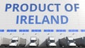 Electric semi-trailer trucks at warehouse loading dock with PRODUCT OF IRELAND text. Turkish logistics related 3D