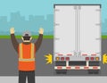 Semi-trailer turned on hazard lights and moving backward. Worker helps to reverse safely and shows stop gesture.