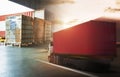 Semi TrailerTrucks Driving on The Road. Packaging Boxes Stacked on Pallets Loading into Cargo Container. Supply Chain. Logistics Royalty Free Stock Photo