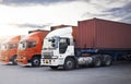 Semi TrailerTrucks Parked Lot with The Sunset Sky. Shipping Container. Delivery, Freight Trucks Logistics Cargo Transport. Royalty Free Stock Photo