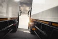 Semi TrailerTrucks Parked with Sunset Sky. Shipping Container Trucks. Truck Wheels Tires. Engine Diesel. Freight Trucks Logistics Royalty Free Stock Photo