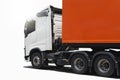 Semi TrailerTrucks Parked on White Background. Shipping Container Trucks. Engine Diesel Trucks. Lorry Tractor. Freight Trucks. Royalty Free Stock Photo