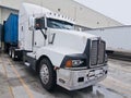 Semi truck cab white blue trailer Royalty Free Stock Photo