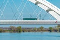 Semi truck crossing the bridge over Danube river Royalty Free Stock Photo