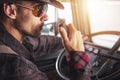Semi Truck Driver Communicating On CB Radio Royalty Free Stock Photo