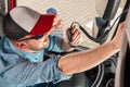 Semi Truck Driver Communicating Using CB Radio Royalty Free Stock Photo